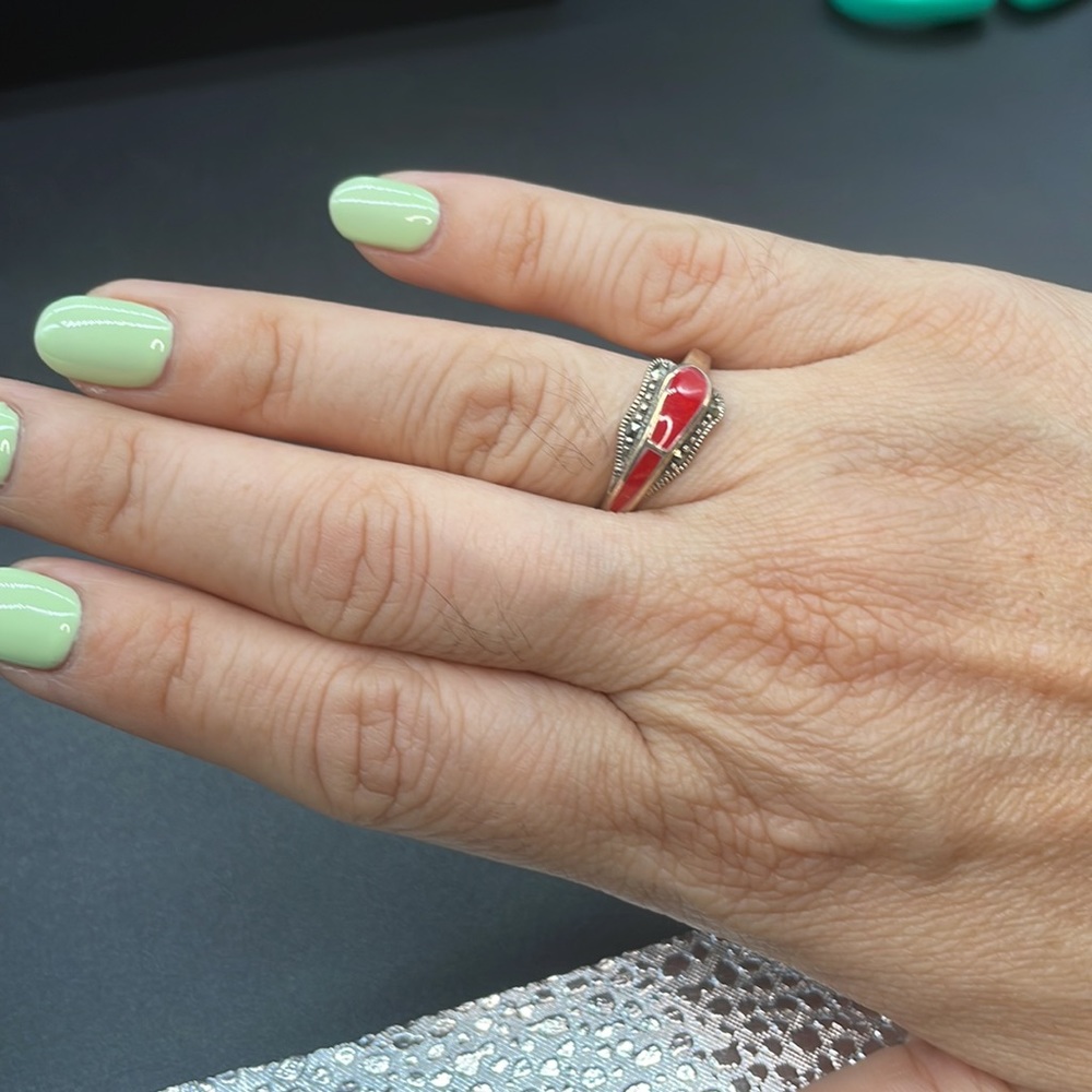 Silver ring with a red stone